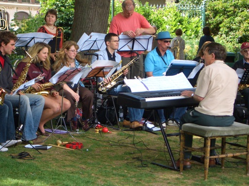 close-up of band members in Paviliion Gardens,